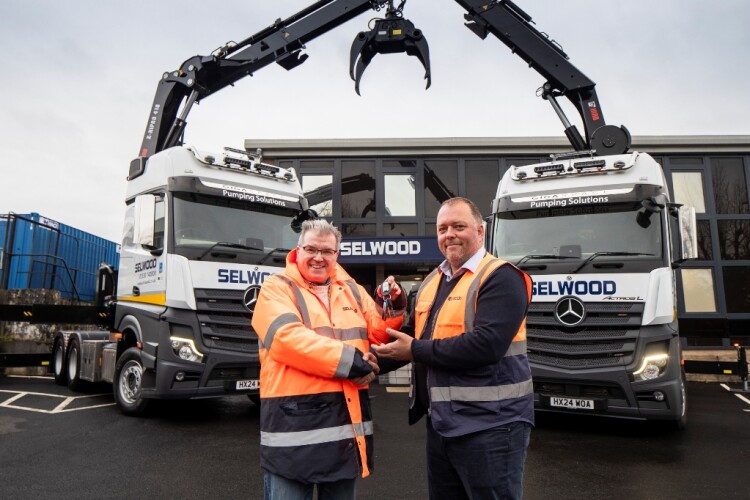 Selwood head of transport Paul Green with special projects and solutions director Dallas Churcher in front of the new vehicles