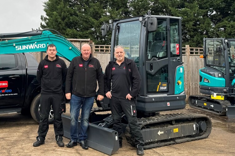Golf & Turf Equipment directors Max White (left) and David White (right) with sales manager Ian Moss (centre)