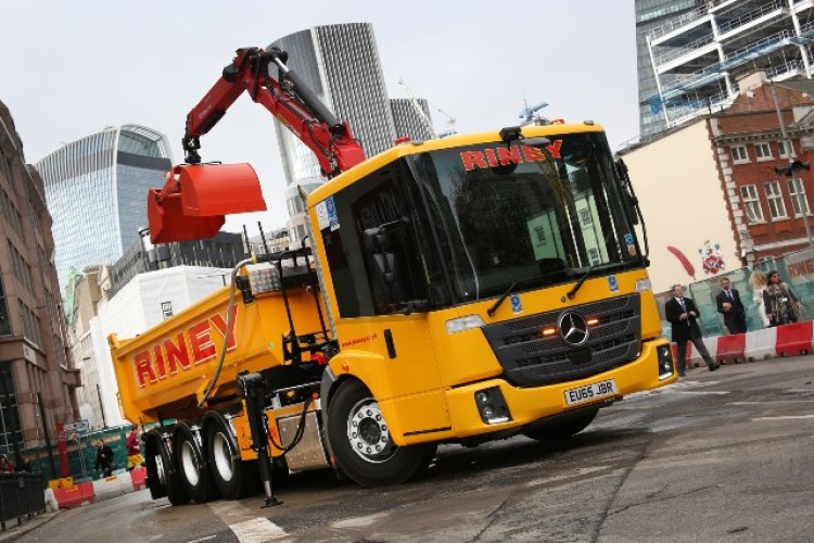 JB Riney's Econic 3235 ENA with tipper body and grab crane