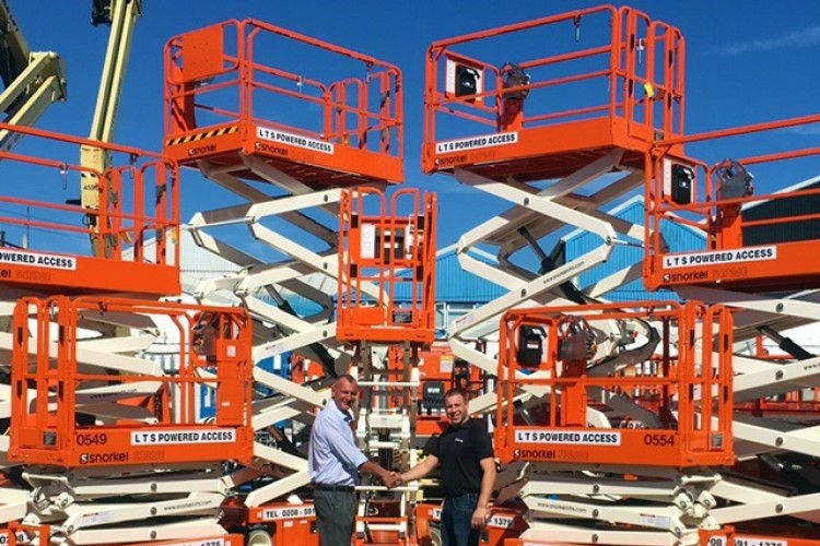 LTS director Paul Fairhall receives the machines from Snorkel sales manager Jim Martyr
