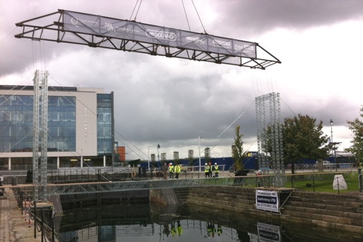 The 30-metre bridge was lowered by crane
