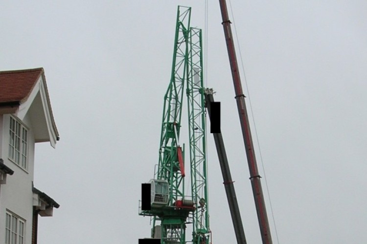 The jib is seen here (and below) being dismantled after its collapse