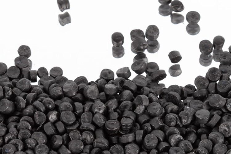 Pellets containing graphene and recycled plastics are meted into the aggregate mix 