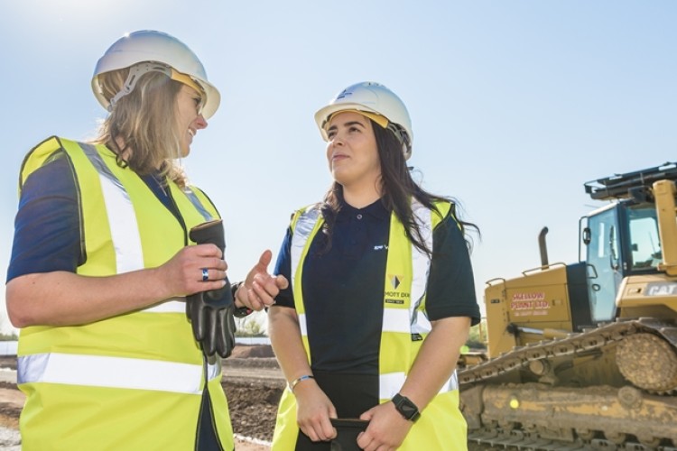 HS2 commercial director Beth West talks to VolkerRail apprentice Nadine McManus at the ground breaking for the National College for High Speed Rail (NCHSR) in Doncaster