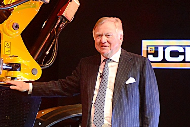 JCB owner Lord Bamford and, below, his letter to employees
