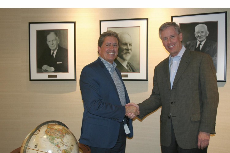 Stantec president and CEO Bob Gomes with MWH Global chairman and CEO Alan Krause
