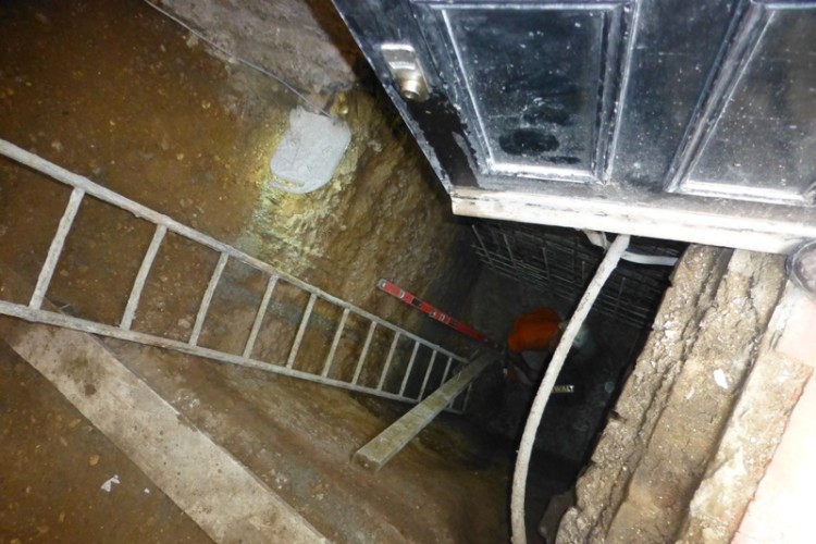 Excavated entrance and exit to and from site