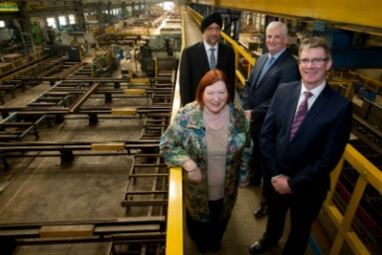 Economy minister Edwina Hart, AIC design director Gursharan Thind, technical director Geoff Badge and CEO Michael Treacy of AIC Steel UK pictured at their new manufacturing facility in Newport