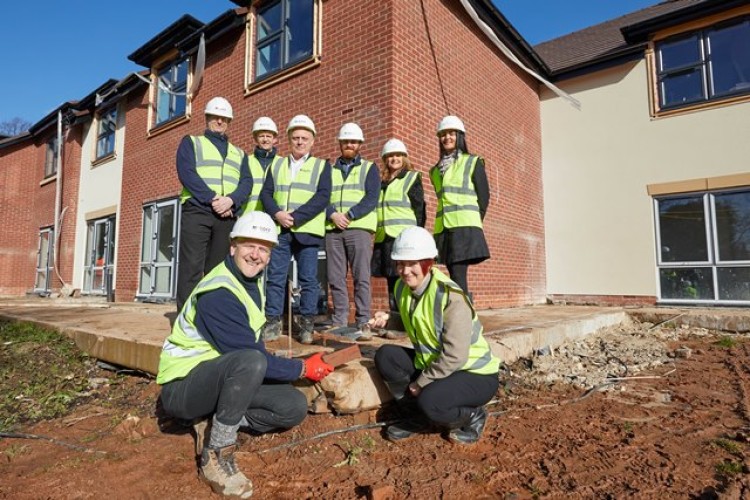  Gerard Rodgers (front left) from McGoff Construction and Mandy Macara of Barchester Healthcare on the Lichfield project. Behind are (left to right) Matt Potter, Chris Riordan, Chris Backhouse, Steve Dixon (all McGoff Construction), Carrie Jahn and Sharon
