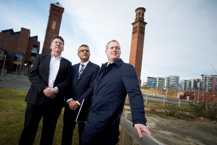 Carillion&rsquo;s Gareth Jackson with HCA director Naz Parkar and a Leeds councillor on the site