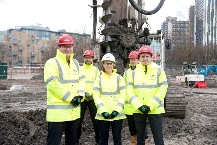 The start on site was marked by a ceremony attended by Southwark councillor Mark Williams, left, and Lend Lease project director Rob Heasman, right, with members of the Lend Lease team.