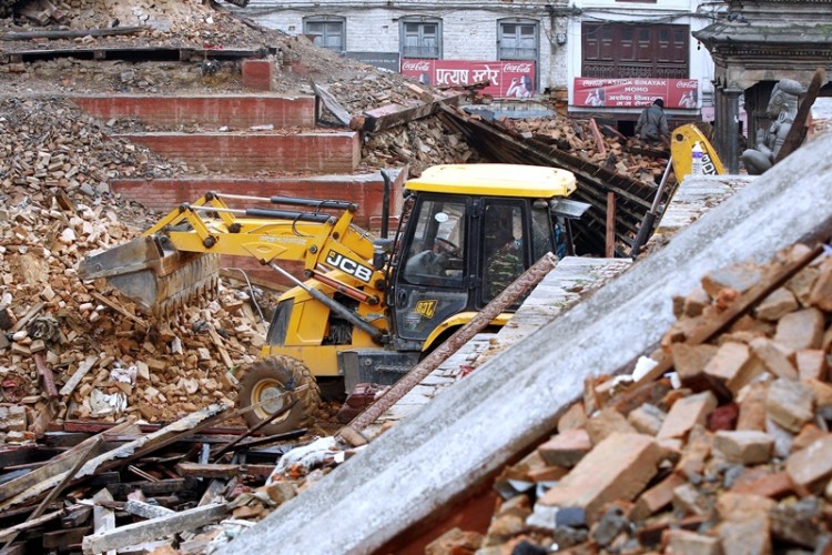 A JCB digger at work in the earthquake disaster area in Kathmandu