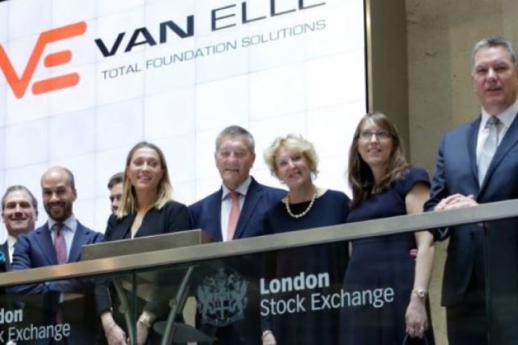 Michael Ellis, centre, surrounded by family and colleagues on the first day of AIM trading in October 2016