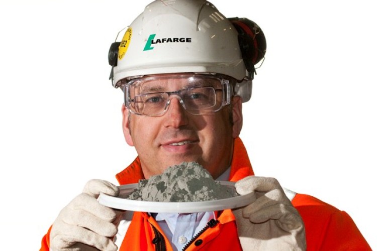 Allan Everett of CelticAsh holding ash that made Welsh low-carbon cement for Pembroke Power Station