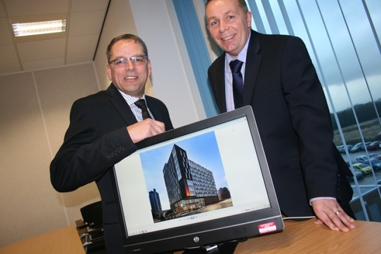 Castle director David Harland (left) and Bowmer & Kirkland regional director Alan Johansen, pictured with a CGI of St Vincent&rsquo;s Plaza