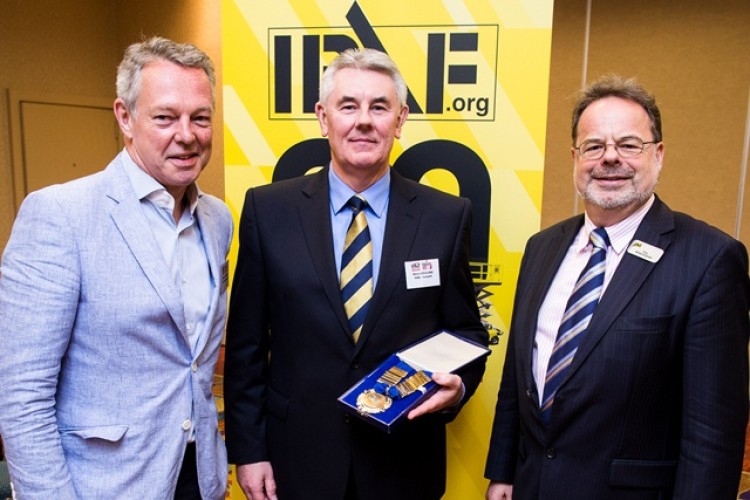 IPAF president Steve Couling (centre) with past president Wayne Lawson (left) and CEO Tim Whiteman (right)