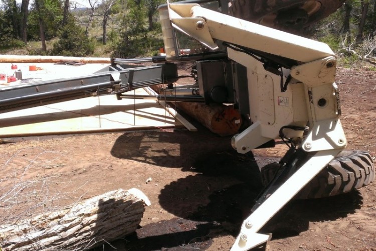 A telehandler that toppled while travelling with suspended load