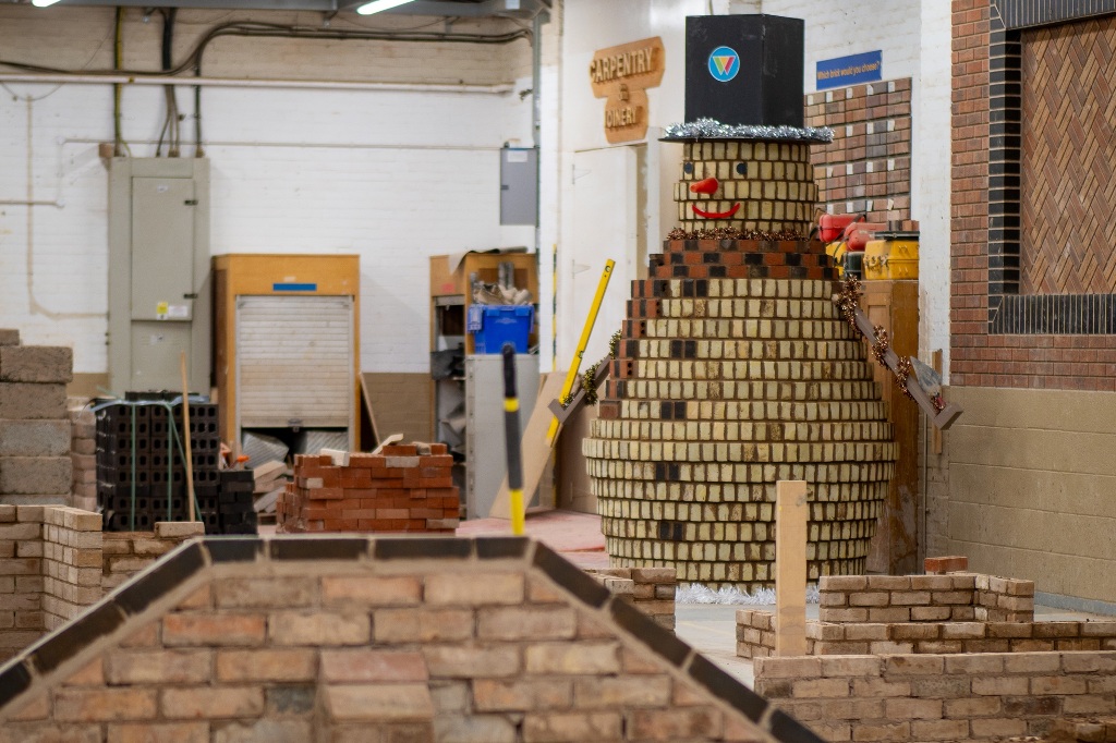 Malvern students build brick snowman
