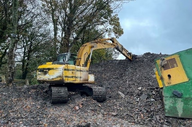 Grab hire firm fined £10,000 after employee struck by falling bucket