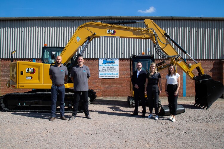 From left, Norris sales manager Jake Hutchinson, MD Andy Norris, Finning&rsquo;s Stewart Carter, Kendall Granville Roberts from Caterpillar Financial Services and Caroline Potter from Caterpillar Commercial