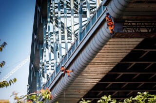 Several techniques, including rope access, have been used to carry out detailed inspections of the bridge structure Several techniques, including rope access, have been used to carry out detailed inspections of the bridge structure