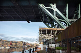 ISS has erected a robust crash deck above the cafes and shops located under the Gateshead lower arch