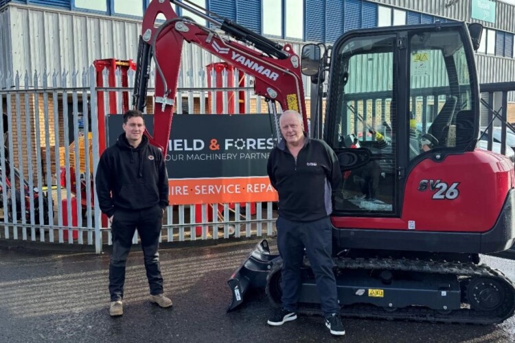 ield and Forest owner Tom Brown with construction equipment specialist Harry Denholm