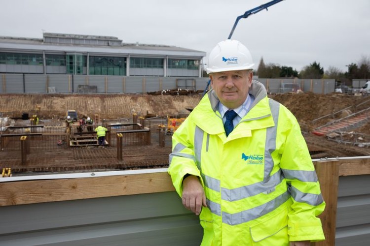 Bob Weston checks over groundworks on the new HQ