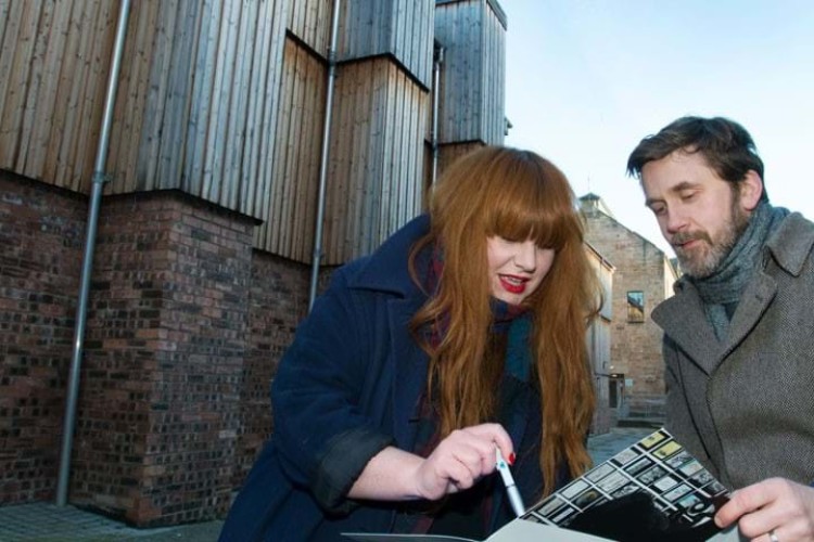 Two members of Historic Environment Scotland's casework team look through a new policy document