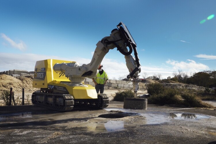 RRES cuts the road surface with a custom chain saw