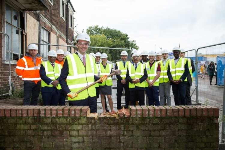 Deputy mayor James Murray starts demolition works