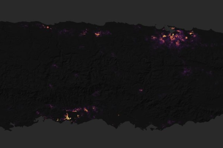 NASA image of Puerto Rico at night shortly after the hurricane (click to enlarge)