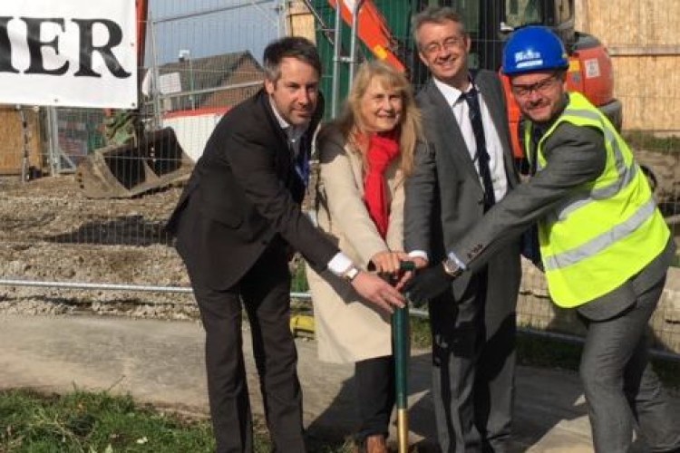 Kier director Nick Shepherd (right) is helped by Adam Goldstein from Astrea Academy Trust, Cllr Jackie Drayton and council director John Doyle