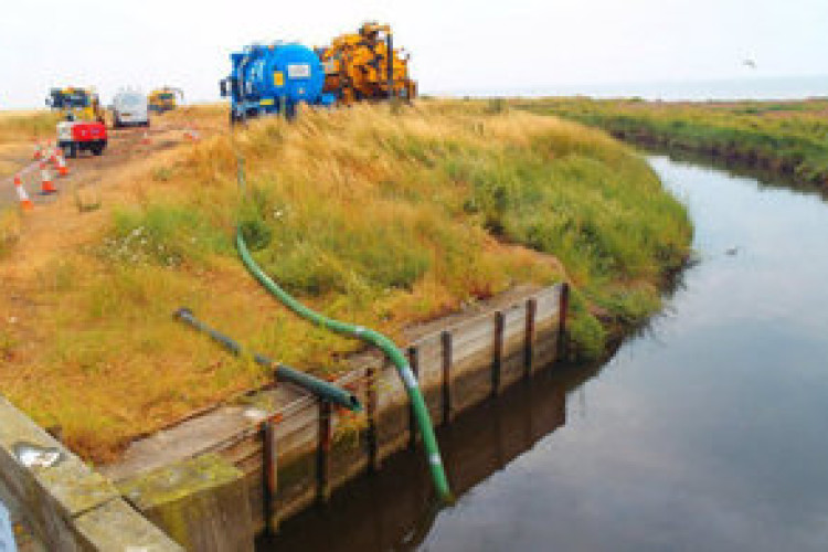 Tankers removing contaminated water in the Swalecliffe Brook