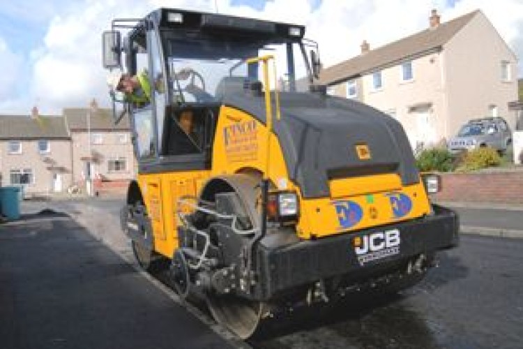 JCB Vibromax VMT860 double-drum vibratory compactor 