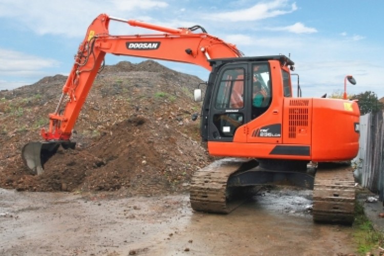 The Doosan DX235LCR crawler excavator