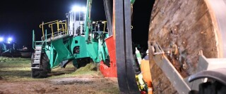 Aneurin Thomas Plant using a Foeck cable ploughing machine, one of the techniques studied in the report