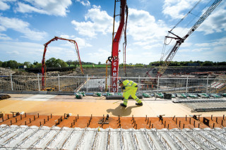 Preparing the deck of the bridge carrying the M6/A14 over the local Swinford Road for a concrete pour 