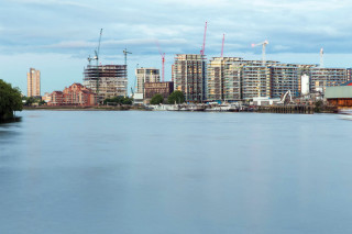 Numerous closely-packed projects, including St James' Riverlight Apartments (above) and Barratt's Nine Elms Point (left) are pooling resources and collaborating to an unprecedented degree