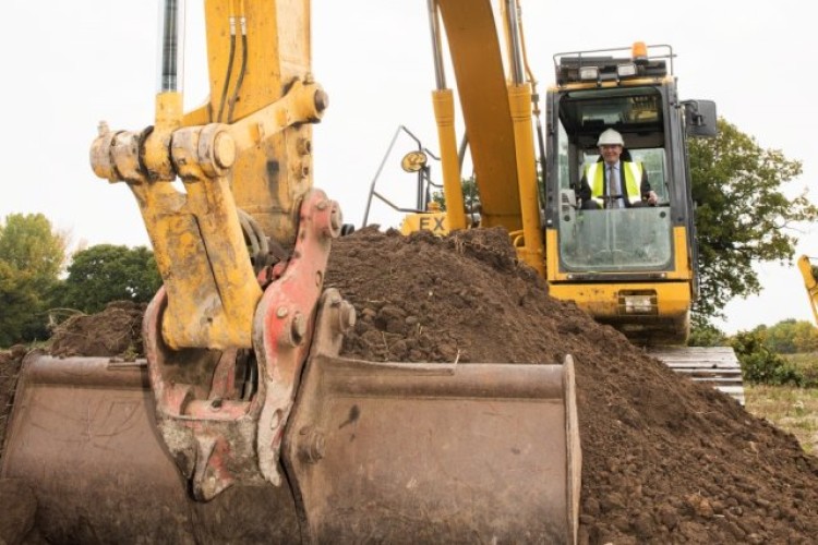 Defence procurement minister Philip Dunne breaks ground on site