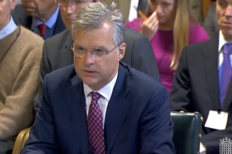 Mark Carne testifies to the committee of MPs