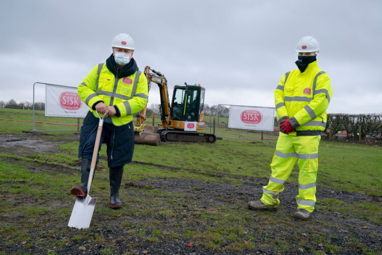 Rochdale councillor Neil Emmott and Sisk managing director Nick Culshaw officially break ground on the project