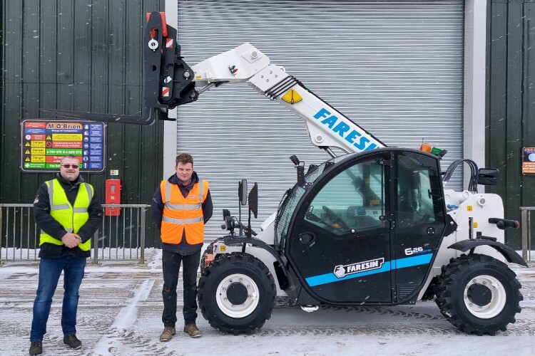 GGR&rsquo;s Janus Britz (left) handing over the batter powered Electric Telehandlers to Martin Ruane of M O&rsquo;Brien.