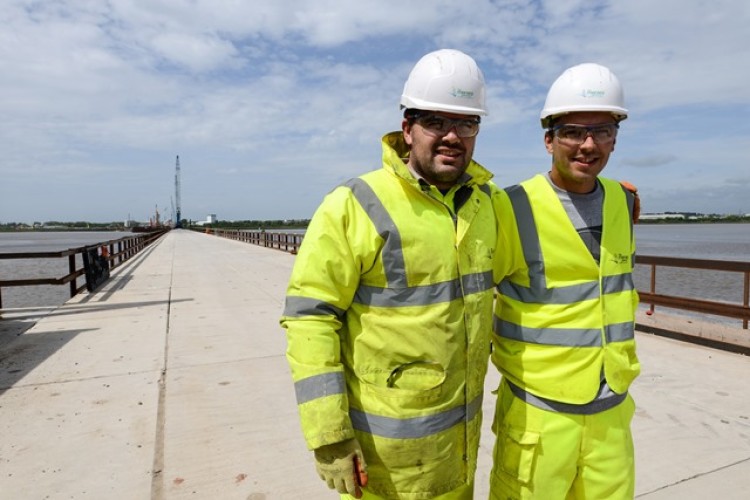 Merseylink construction workers Thomas Duncalf, left, and Asa Humphrey on the newly completed trestle bridge