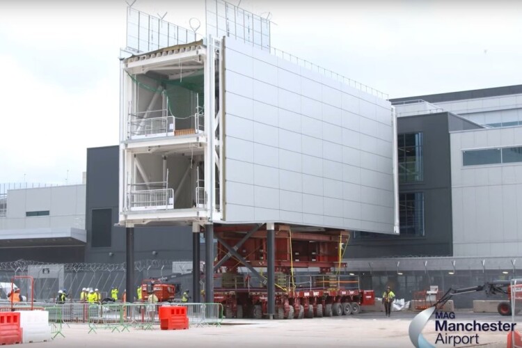 The 216-tonne structure is transported into place