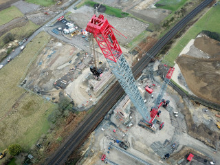 The LR1750-2 crane has a wide boom system that gives it the same lifting capacity as some larger crawler cranes  
