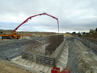 The in situ concrete abutments carry the bridge as an integral structure 