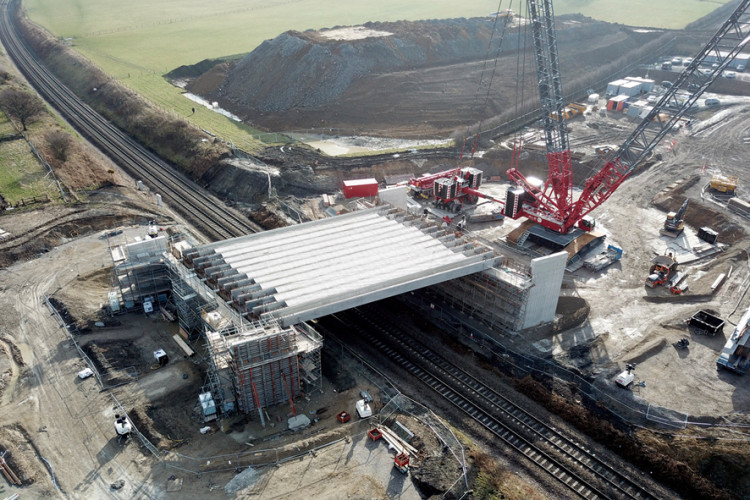 The bridge is an integral structure formed from nine 30m-long precast prestressed W10 concrete beams and an in situ abutment 