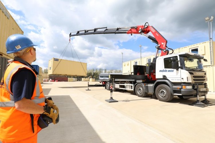 The 82-tonne-metre Fassi 820 crane can double and triple stack containers
