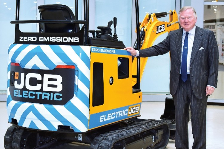 Lord Bamford with his new battery-powered digger